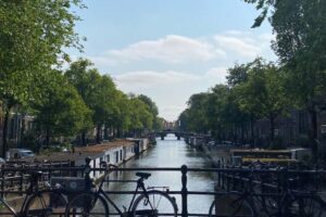 Canal in Amsterdam with Bikes on Railing