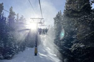 Ski list silhouette through snow